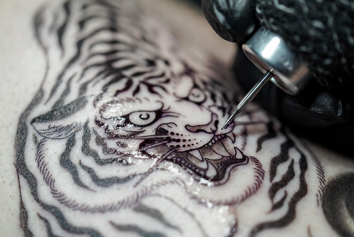 Tattoo session in progress